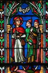 Stained (19th century) glass of Jesus and the Emmaus pilgrims.