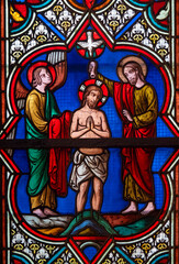 Stained glass (19th century) of Baptism of Jesus by John the Baptist in the Jordan river.