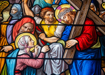 Stained glass (1914) of The Way of the Cross. Sixth station: Veronica wipes Jesus' face.