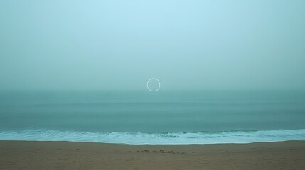 Misty Beach Seascape with Minimalist Circle Graphic Design Element