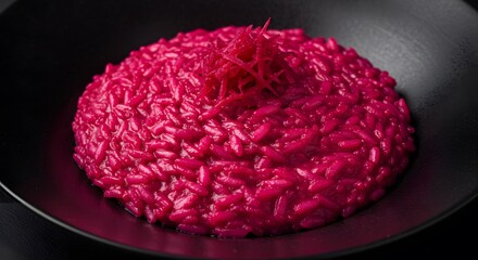 Obraz premium Vibrant Magenta Risotto Dish on Dark Plate Food Photography
