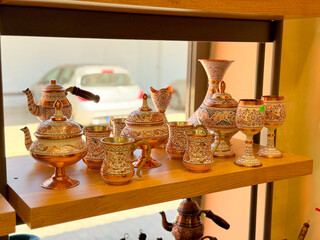 Hand-painted ceramic teapots and decorative vases. Cultural artistry, folk heritage and traditional craftsmanship in vibrant ceramic design.