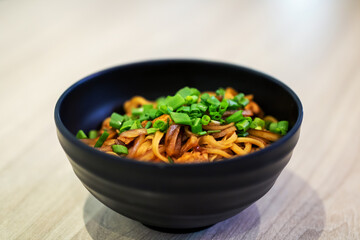 Delicious and Flavorful Noodles Generously Topped with Fresh Green Onions