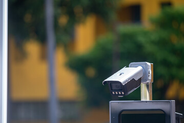 Surveillance Camera on Urban Background