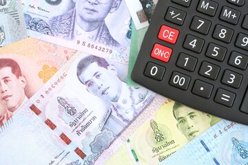 Thai baht currency money bills and calculator. The concept of taxation and money count
