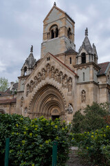 Facade of Jaki or Jak chapel or church in Vajdahunyard Castle is castle in City Park, Budapest, Hungary, Europe. Vertical image © Olga Bryukhova