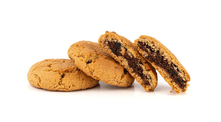 Chocolate cookies with chocolate filling isolated, brown round biscuits, broken sweet cocoa pastry