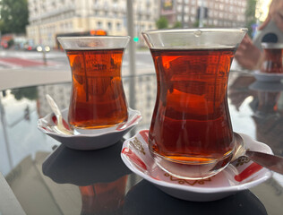 Turkish Tea on a Street Cafe Table, Traditional Arabic Cup in Restaurant, Black Tea Drinking