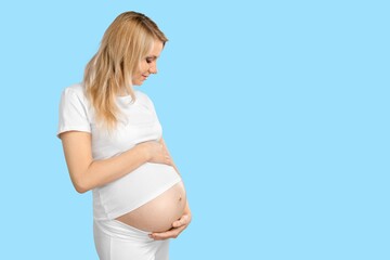 Pregnancy Concept. Young Happy Woman Touching Belly