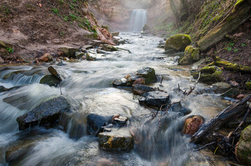 Waterfall in the forest. Horizontal orientation. 