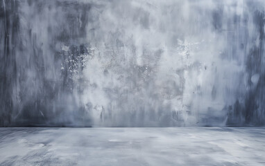 A textured gray backdrop features a mix of light and dark tones, creating a subtle yet interesting surface ideal for various photography styles in a studio setting