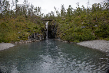 Silverfallet waterfall near the mountain village of Bjorkliden in Kiruna municipality, northern Sweden.