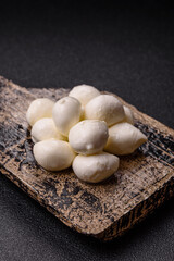 Mozzarella cheese balls, fresh white mini slices for Mediterranean food. Mozzarella cheese