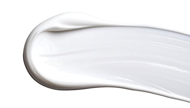 A smooth, creamy texture of a light-toned cosmetic product is displayed against a plain white background.