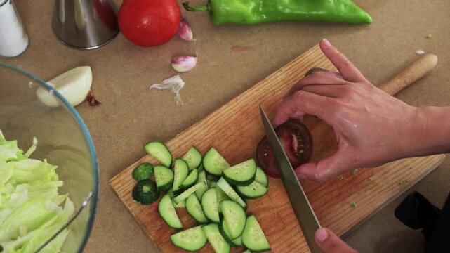Close-Up of Preparing a Healthy Vegetable Salad in the Kitchen