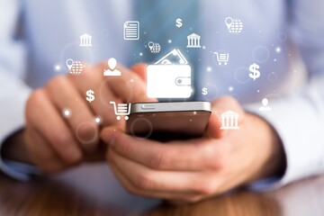 Businessman using modern smartphone with digital wallet