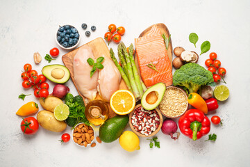 Healthy food assortment on white background.