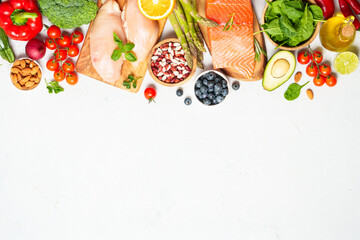 Healthy food assortment on white background.