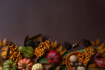 Autumn decorations with pumpkins and leaves.