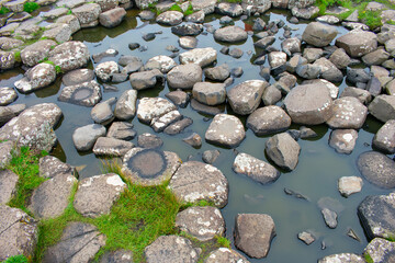 Giant's Causeway in Northern Ireland. Rock formations and basalt hexagonal columns on Coast of...