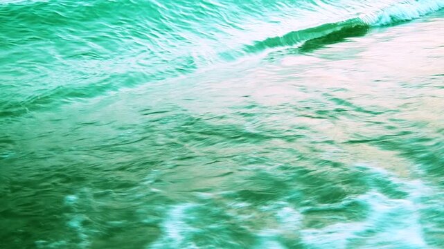 Witness the tranquil morning as waves softly break on the sandy shores of Canj, Montenegro. The serene waters of the Adriatic create a perfect coastal escape. Mediterranean