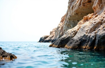 Naklejka premium Cliffs and ocean water in a scenic coastal landscape