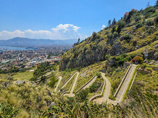 View of the winding old stone path leading up Mount Pellegrino, Sicily