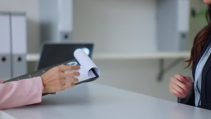 Professional applicant closing deal with recruiter by firm handshake in career opportunity meeting