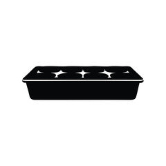 A black silhouette of a rectangular planting tray with seed starter cells