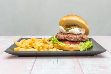 Chefs don't leave how they cook their burgers to chance