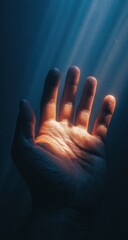 Reaching hand, dramatic light, underwater, spiritual concept