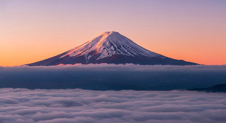 Fototapeta premium Majestic Mount Fuji Rising Above a Sea of Clouds at Sunrise