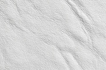 White textured leather surface close-up with detailed grain pattern