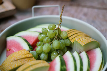 Fresh fruit on the plate. Close up. 