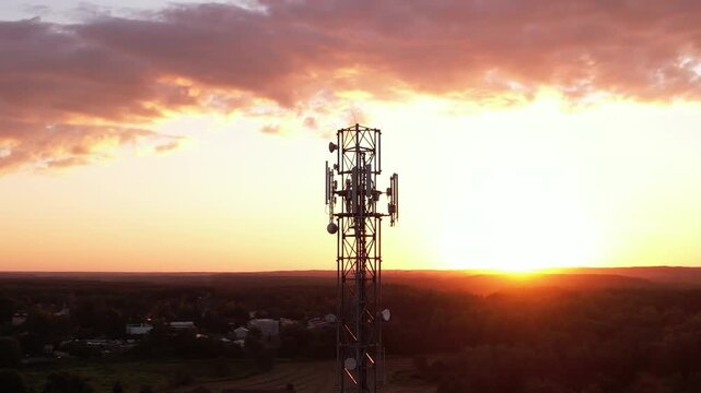 Aerial View of Tower Antenna Telecommunication Cell Phone, Radio Transmitters of Cellular 5g 4g Mobile Phone. Cellular Mobile Signals Providing High Speed 4g and Modern 5g Traffic Network Service. - Powered by Adobe