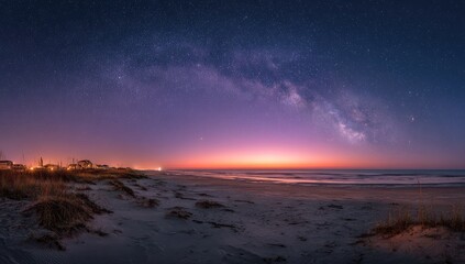 Fototapeta premium Panoramic beach scene at dawn, Milky Way prominent