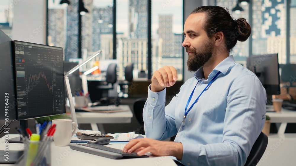 Poster trader in office doing brainstorming before committing to investment, smiling, expressing trust in c