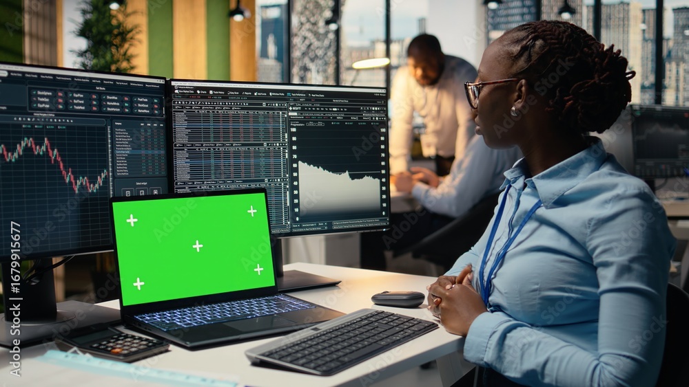 Poster prop firm trader in office learns new trading strategies from video lesson on isolated screen laptop