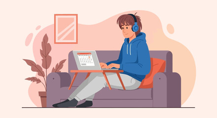 Young man in headphones working remotely on laptop from a comfortable sofa at home. Depicts flexible freelance work or online study.