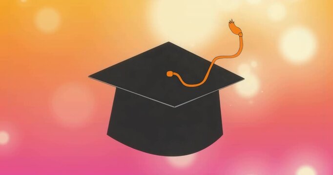 Soft breeze starting orange tassel swaying, highlights pulsing behind center cap marking graduation