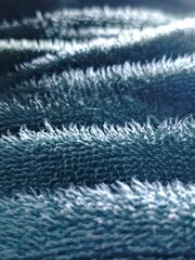 Abstract BlueGray Plush Fabric Texture with Soft Fuzzy Pile Detail.