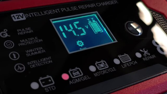 Intelligent Battery Charger Display Powering Up Temperature Reading and Full Charge.