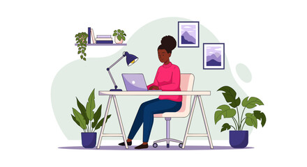 Productive young Black woman working on her laptop at a cozy home office desk. Illustrates remote work, education, and modern lifestyle.