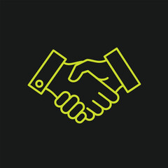 Obraz premium Two hands shaking in a professional setting, symbolizing agreement and collaboration against a dark background