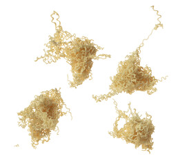Pouring instant Noodle fall spill splash. Instant noodle fly in mid air. Noodle food is ramen Japanese soup Chinese. White background isolated