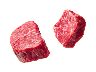 Three dynamic, levitating chunks of raw diced blade steak. Tender and lean, these are perfect for premium beef kebabs, skewers, or quick searing.