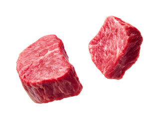 Three dynamic, levitating chunks of raw diced blade steak. Tender and lean, these are perfect for premium beef kebabs, skewers, or quick searing.
