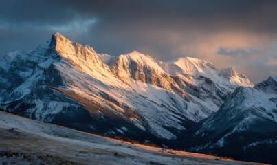 Mountain peaks bathed in golden sunrise