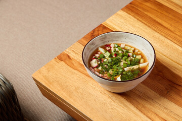 Delicious and Fresh Herb and Vegetable Soup Served in an Elegant and Stylish Bowl