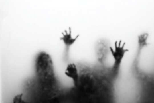 A haunting scene features dark hands pressed against misted glass, with blurred silhouettes rising behind a translucent barrier, creating a chilling, mysterious moment of fear. - Powered by Adobe